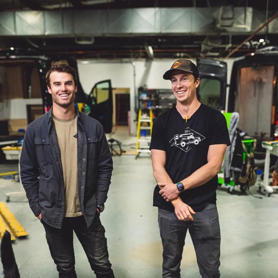 The two owners of Rossmonster in their vehicle-build shop